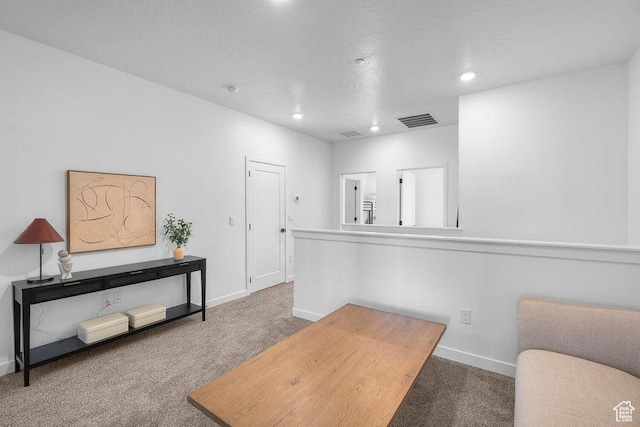 carpeted home office with recessed lighting, baseboards, and visible vents