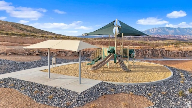 community playground featuring a mountain view