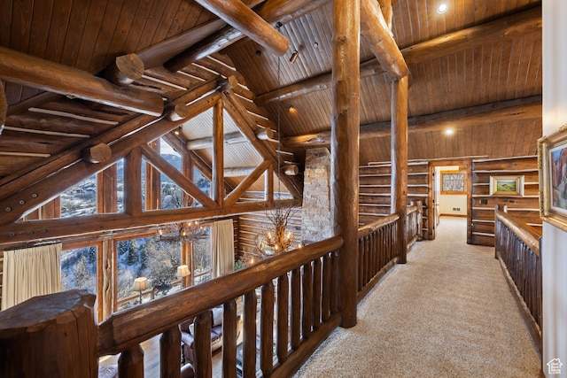 4115 Moose Hollow Loop, Park City, UT 84098 - hallway with wood ceiling with exposed beams, rustic walls, carpet, and high vaulted ceiling
