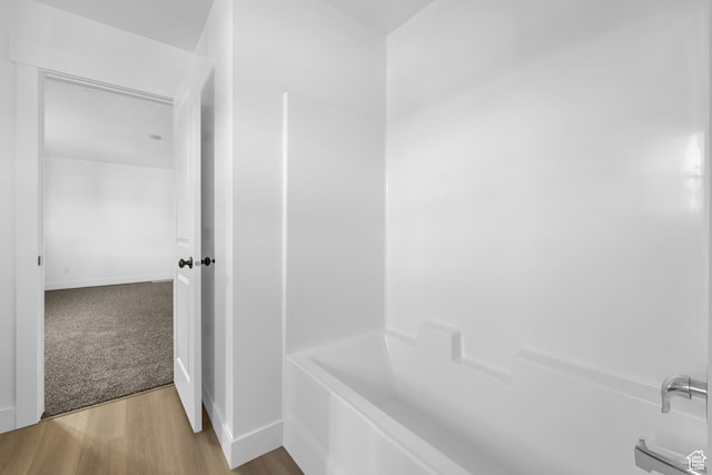 1667 S Marigold Way Unit 230E, Santaquin, UT 84655 - bathroom with baseboards and wood finished floors
