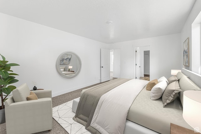 1667 S Marigold Way Unit 230E, Santaquin, UT 84655 - bedroom featuring light colored carpet and a walk in closet