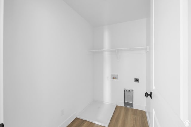 1667 S Marigold Way Unit 230E, Santaquin, UT 84655 - laundry area featuring wood finished floors, electric dryer hookup, laundry area, baseboards, and hookup for a washing machine