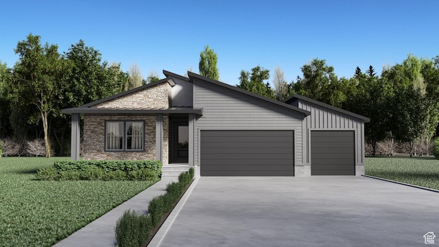 view of front facade with concrete driveway, an attached garage, stone siding, and a front lawn