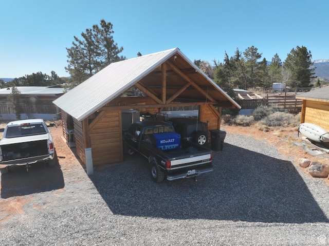 365 W Sleeping Rainbow Dr, Torrey, UT 84775 - view of car parking with fence and a detached carport