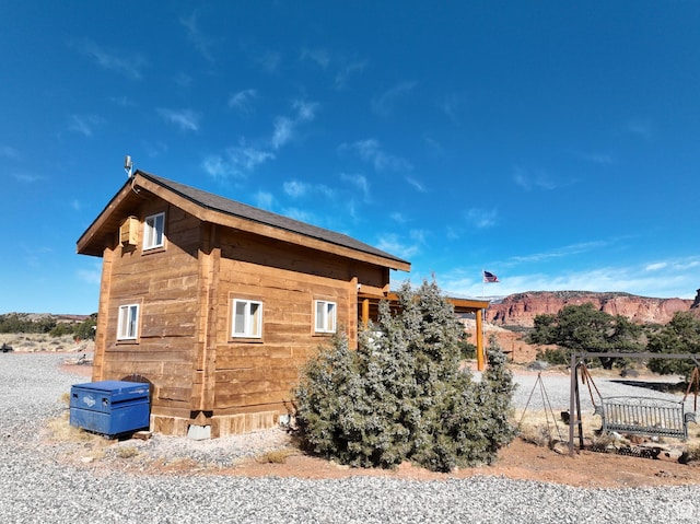 365 W Sleeping Rainbow Dr, Torrey, UT 84775 - view of side of home featuring a mountain view