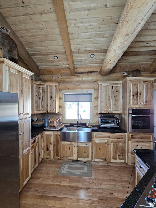 365 W Sleeping Rainbow Dr, Torrey, UT 84775 - kitchen with a sink, dark countertops, and appliances with stainless steel finishes