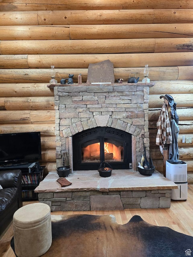 365 W Sleeping Rainbow Dr, Torrey, UT 84775 - interior details featuring log walls, wood finished floors, and a stone fireplace