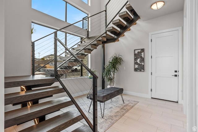 1036 E Fremont St, Washington, UT 84780 - stairs featuring a high ceiling and baseboards