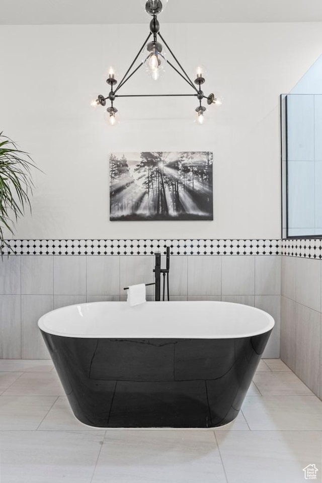 1036 E Fremont St, Washington, UT 84780 - full bath with a freestanding tub, tile walls, and tile patterned flooring