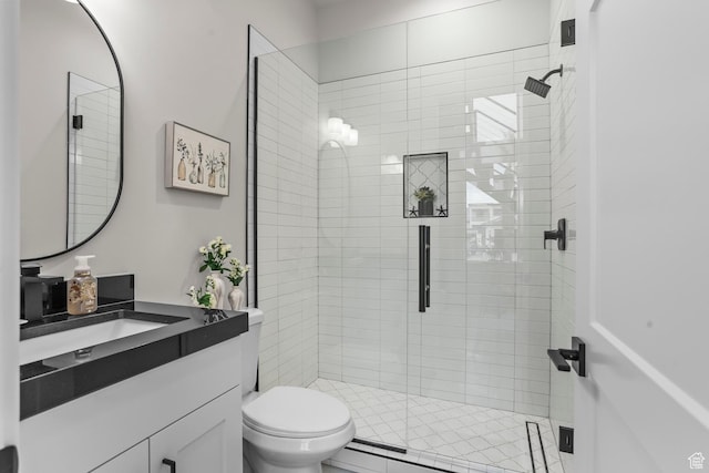 1036 E Fremont St, Washington, UT 84780 - bathroom featuring a shower stall, a baseboard heating unit, toilet, and vanity