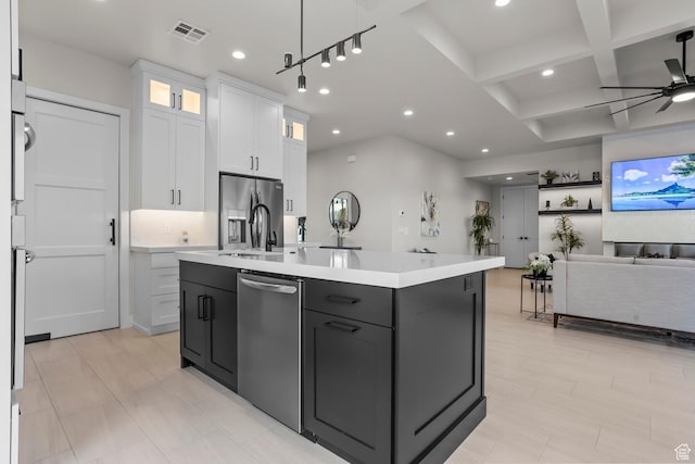 1036 E Fremont St, Washington, UT 84780 - kitchen featuring visible vents, open floor plan, light countertops, appliances with stainless steel finishes, and white cabinets