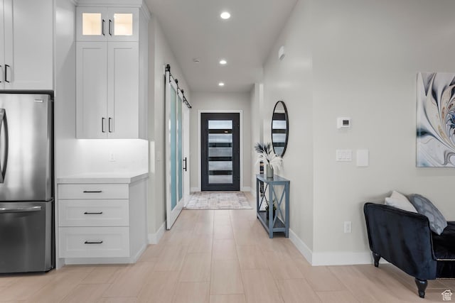 1036 E Fremont St, Washington, UT 84780 - foyer with recessed lighting, baseboards, and a barn door