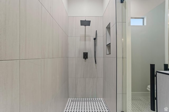 1036 E Fremont St, Washington, UT 84780 - full bathroom featuring toilet, baseboards, and tiled shower