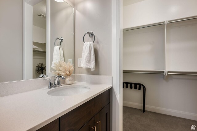 262 Ladera Dr, Washington, UT 84780 - bathroom featuring vanity, baseboards, and visible vents