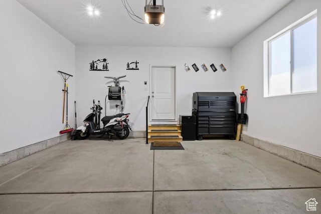 garage featuring a garage door opener