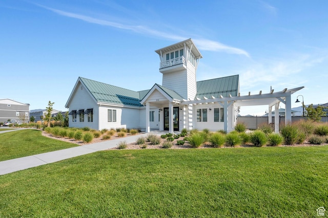 388 N Regatta Ln, Saratoga Springs, UT 84045 - view of front of property with a standing seam roof, a front lawn, a pergola, and metal roof
