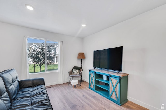 388 N Regatta Ln, Saratoga Springs, UT 84045 - living room with recessed lighting, baseboards, and wood finished floors