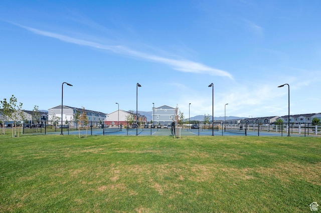 388 N Regatta Ln, Saratoga Springs, UT 84045 - view of tennis court featuring a yard and fence