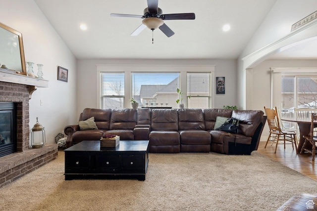 1035 E 300 S, Santaquin, UT 84655 - living area with a ceiling fan, a brick fireplace, vaulted ceiling, and recessed lighting