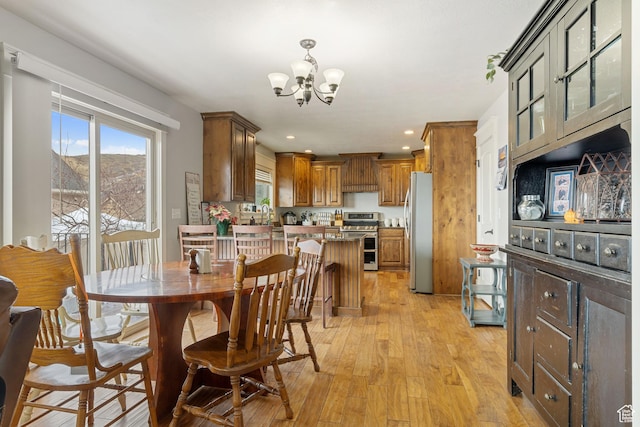 1035 E 300 S, Santaquin, UT 84655 - dining space featuring recessed lighting, light wood-style floors, and a notable chandelier
