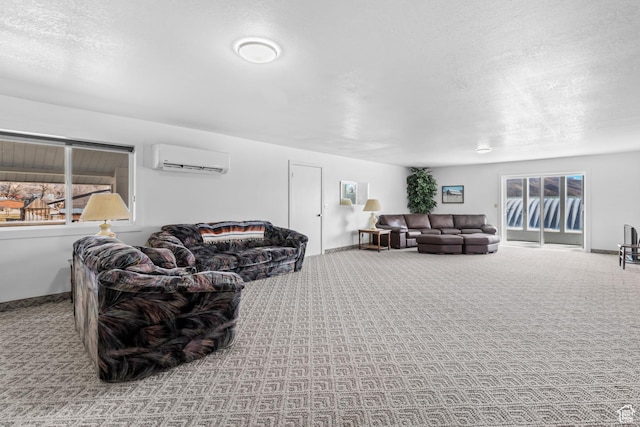 carpeted living area featuring a wall unit AC, baseboards, a wealth of natural light, and a textured ceiling