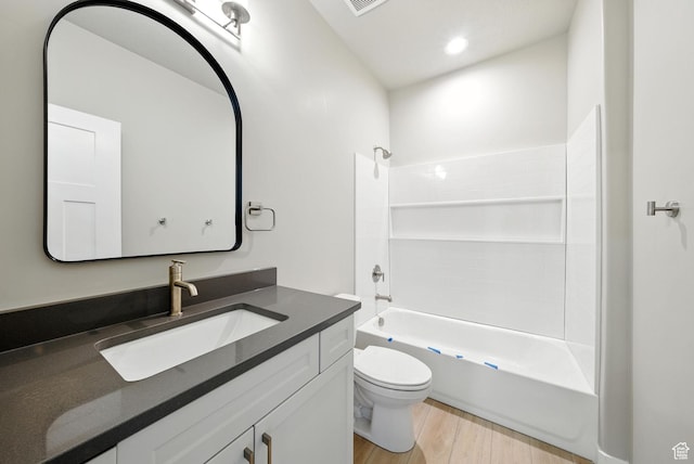 552 E 41st St, South Ogden, UT 84403 - bathroom featuring vanity, wood finished floors, bathtub / shower combination, and recessed lighting