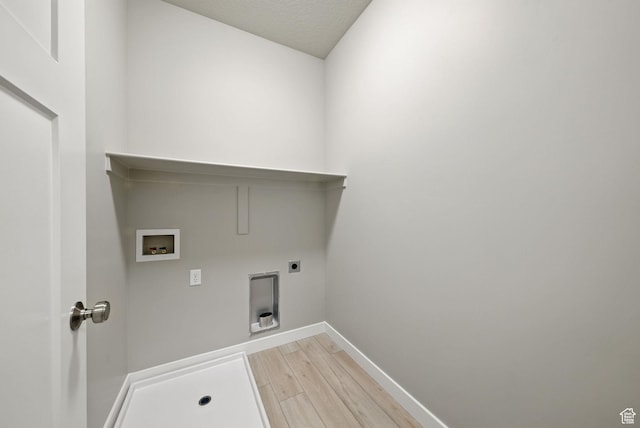 552 E 41st St, South Ogden, UT 84403 - laundry room with light wood-type flooring, hookup for a washing machine, and hookup for an electric dryer