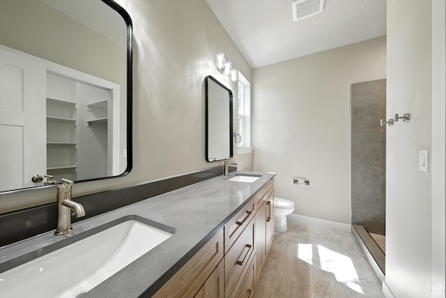 552 E 41st St, South Ogden, UT 84403 - bathroom featuring double vanity and tiled shower
