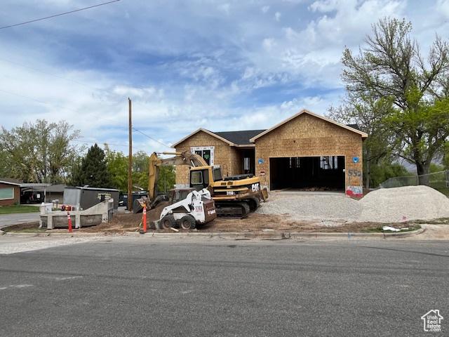 552 41st St, South Ogden, UT 84403 - view of front of home with an attached garage and driveway