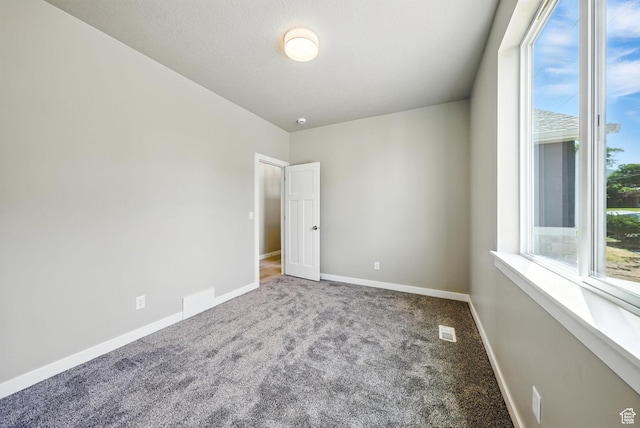 552 E 41st St, South Ogden, UT 84403 - carpeted empty room with baseboards