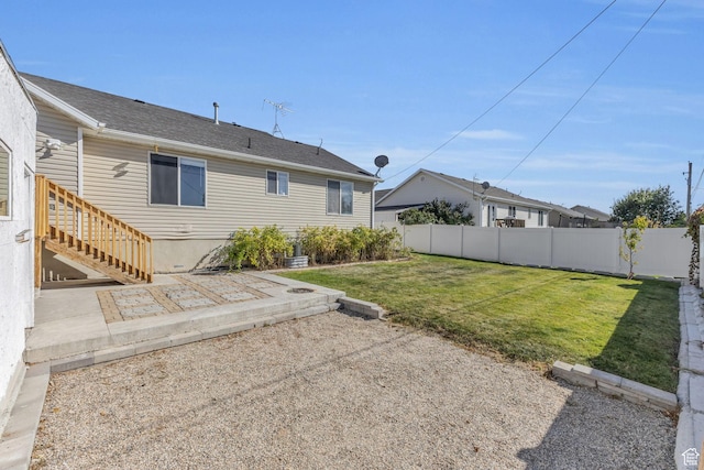 162 S 500 W, Tremonton, UT 84337 - rear view of house featuring a patio area, a lawn, and fence