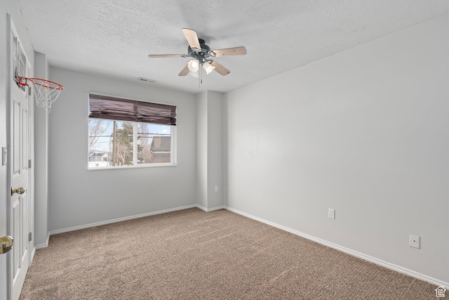137 W 600 N Unit 205, Tooele, UT 84074 - carpeted empty room with visible vents, a ceiling fan, baseboards, and a textured ceiling