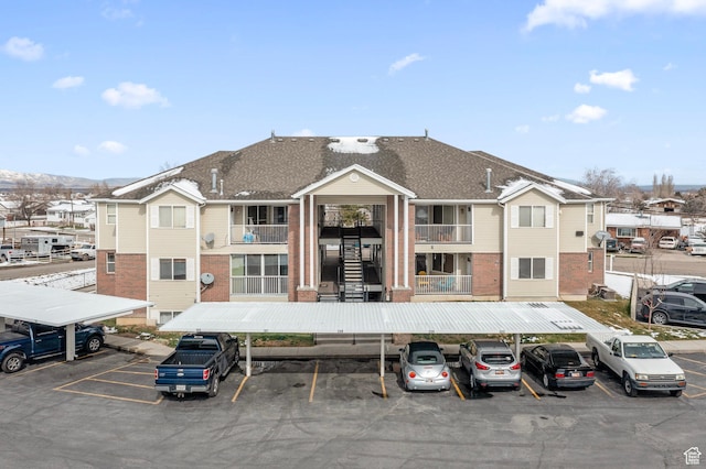 137 W 600 N Unit 205, Tooele, UT 84074 - view of property with covered and uncovered parking