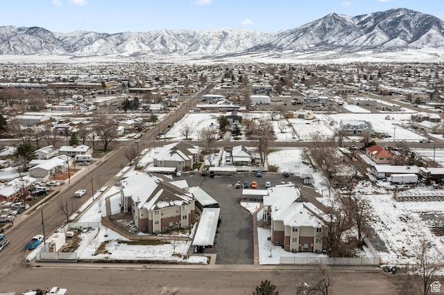 137 W 600 N Unit 205, Tooele, UT 84074 - snowy aerial view with a residential view and a mountain view