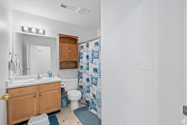 137 W 600 N Unit 205, Tooele, UT 84074 - bathroom with visible vents, toilet, vanity, and a textured ceiling