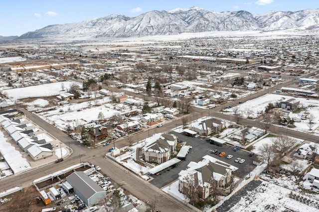 137 W 600 N Unit 205, Tooele, UT 84074 - snowy aerial view with a mountain view and a residential view