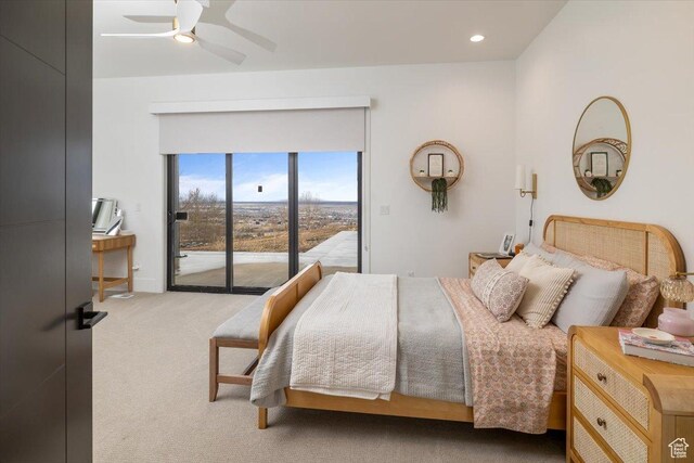 2940 Naomi Dr, North Logan, UT 84341 - bedroom with access to exterior, carpet floors, and a ceiling fan