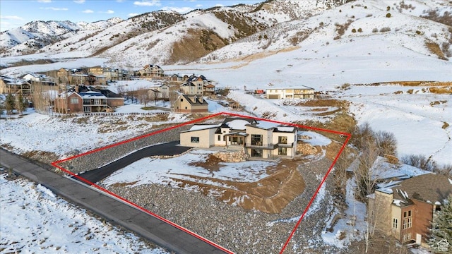 2940 Naomi Dr, North Logan, UT 84341 - snowy aerial view featuring property boundaries highlighted, a residential view, and a mountain view