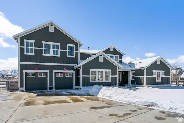 165 E Wasatch Way, Snyderville, UT 84098 - view of front facade with board and batten siding, concrete driveway, and a garage