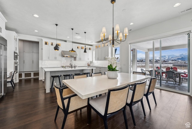 165 E Wasatch Way, Snyderville, UT 84098 - dining room featuring dark wood finished floors, a chandelier, recessed lighting, and visible vents