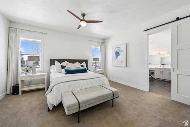 165 E Wasatch Way, Snyderville, UT 84098 - bedroom with a ceiling fan, baseboards, carpet floors, and connected bathroom