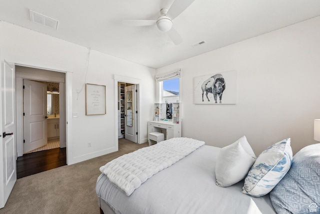 165 E Wasatch Way, Snyderville, UT 84098 - bedroom featuring a walk in closet, a ceiling fan, visible vents, and carpet floors