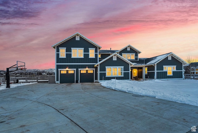 165 E Wasatch Way, Snyderville, UT 84098 - view of front facade with an attached garage, fence, and driveway