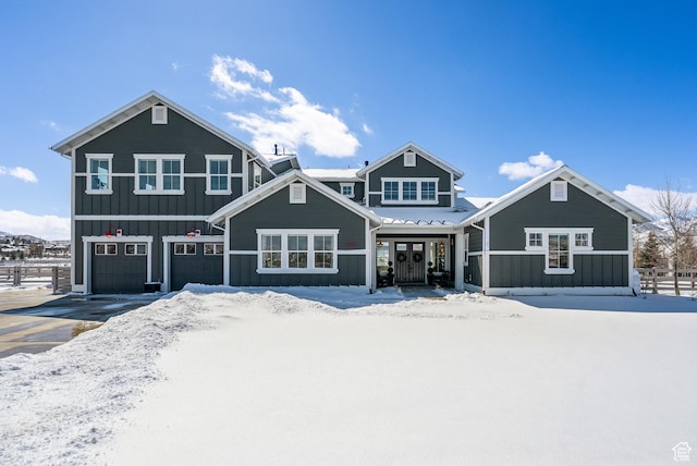 165 E Wasatch Way, Snyderville, UT 84098 - view of front of house with board and batten siding, french doors, a garage, and fence