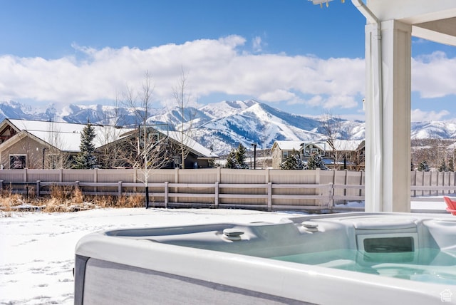 165 E Wasatch Way, Snyderville, UT 84098 - view of swimming pool with a mountain view, a hot tub, and a fenced backyard