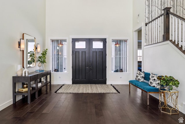 165 E Wasatch Way, Snyderville, UT 84098 - foyer with visible vents, baseboards, a high ceiling, stairs, and hardwood / wood-style flooring