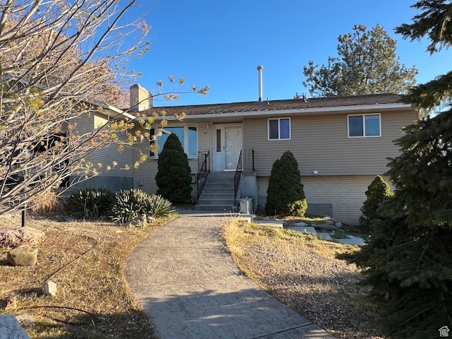 916 E Sunburn Ln, Sandy, UT 84094 - single story home featuring brick siding and a chimney