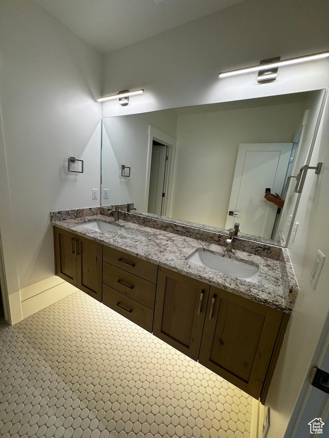 3151 E 5225 N Unit 11, Liberty, UT 84310 - full bathroom with double vanity and a sink