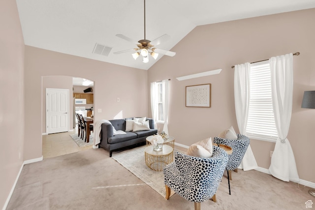 8851 S Humboldt Ct W, West Jordan, UT 84081 - living area with arched walkways, lofted ceiling, carpet flooring, and ceiling fan