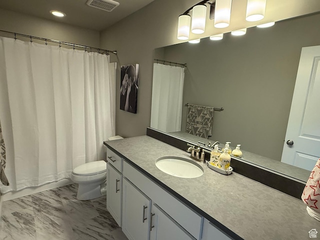 full bathroom featuring visible vents, marble finish floor, toilet, and vanity